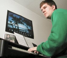 Joe playing piano at apartment